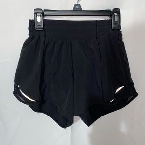 Lululemon hotty hot highrise shorts size 2 tall, black with reflective material.